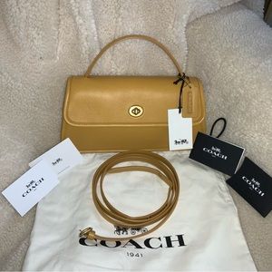 Coach 1941 limited edition Turnlock Clutch NWT